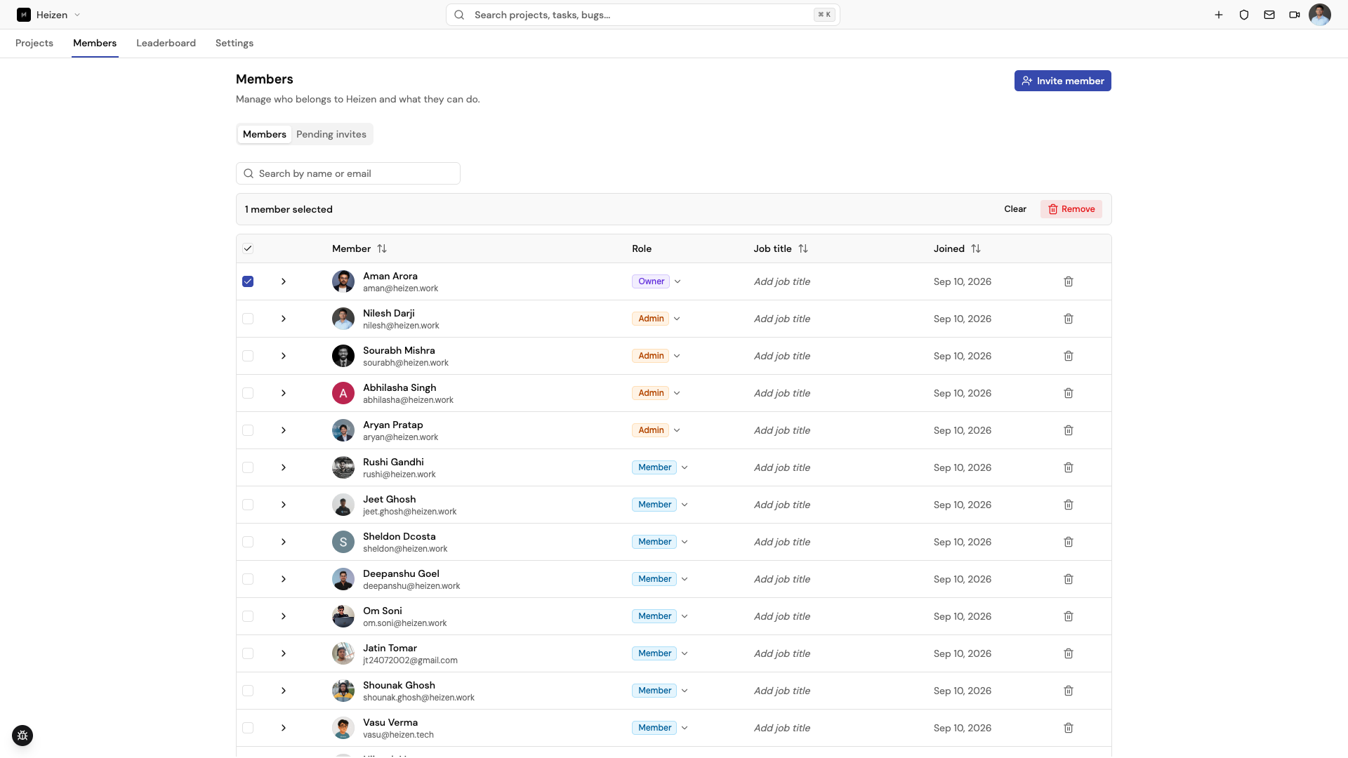 Organization members page with roles, pending invites, and bulk selection